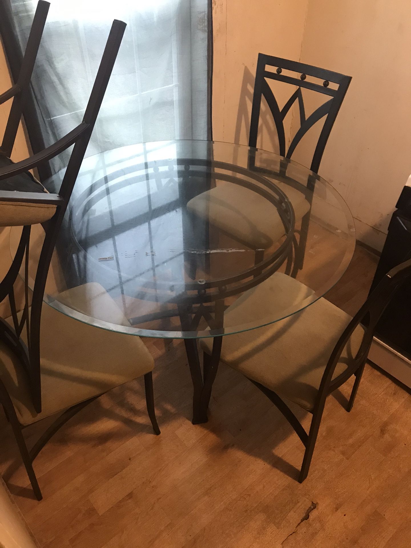 Getting rid of the glass kitchen table wit 4Chairs