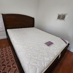 Solid wood queen size bed with headboard and mattress
