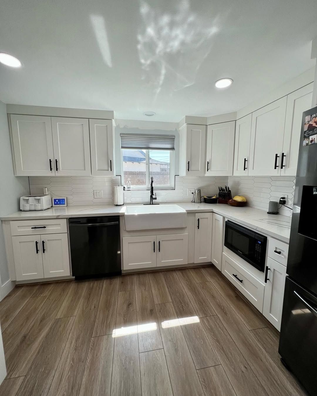 Shaker White Cabinets / L shape Kitchen at an Affordable