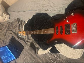 Red and black electric guitar