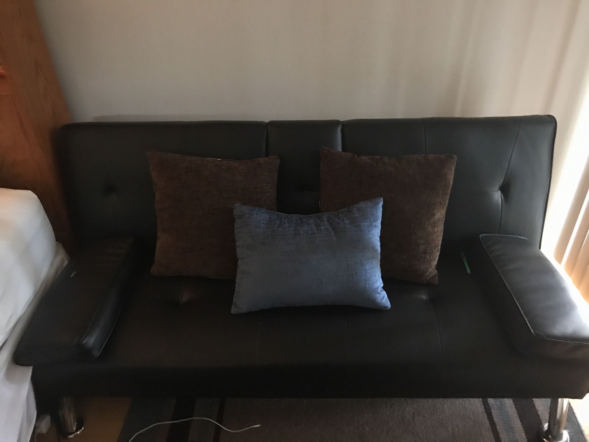 Leather futon with cup holders