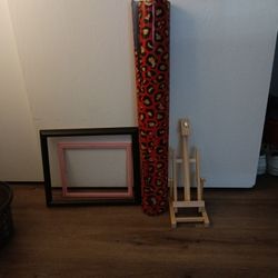 Frames, Wraping Paper, And A Canvas Holder