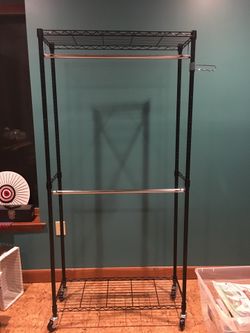 Rolling metal garment rack clothing rack