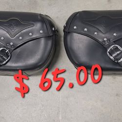 a pair of leather motorcycle cases in good condition