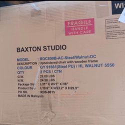 upholstered chair with a wooden frame and model number RDC809B-AC-Steel/Walnut- is identified as the Baxton
