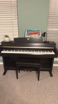 Yamaha Clavinova Piano and bench