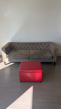 Gray Tufted Sofa.  Ottoman is not included