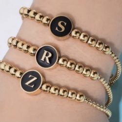 stainless steel bracelet with letter “F”