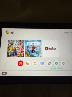 Nintendo Switch with Super Smash Bros. Ultimate