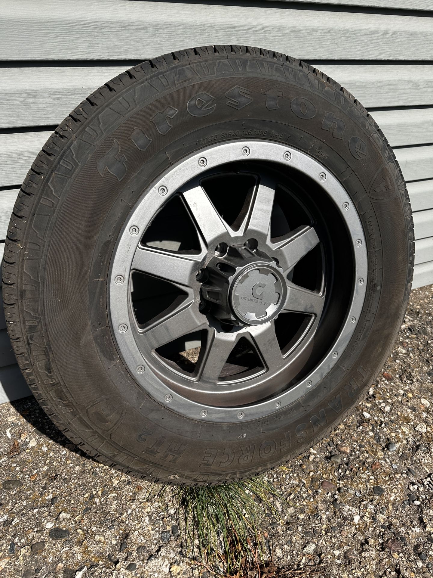 4- Firestone Transforce HT2 LT275/65R20 Truck Tires and 20x9 Anthracite Rims with 315MHZ pressure sensors