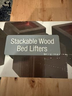 Wood bed lifters