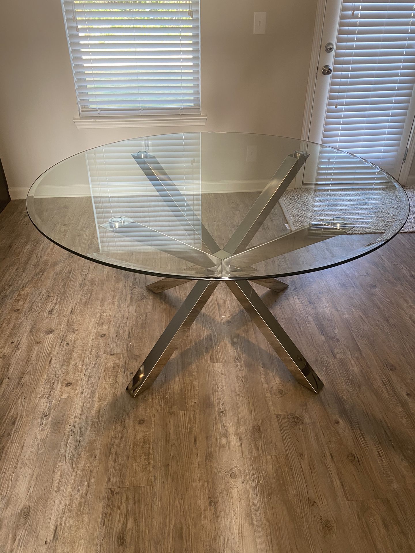 MUST GO!!!! ONLY $600!!!! Round glass dining table with stainless steel finish!