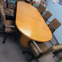  solid oak conference table With 8 chairs