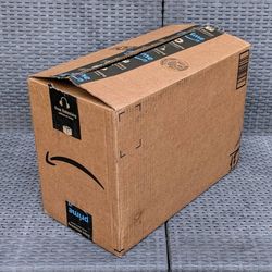 Medium size clean cardboard box with foam packing peanuts for shipping moving or storage