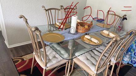 Dining set with a glass table