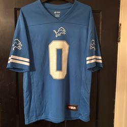 Detroit Lions Jahmyr Gibbs #0 honalulu blue NFL team apparel sizes small, XL & XXL available