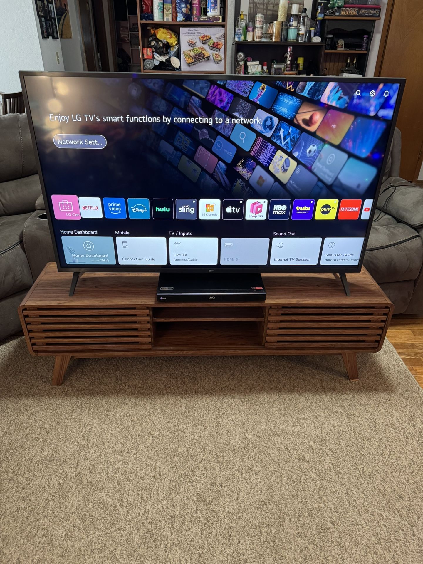 LG 55” TV With Lorccan TV Stand And LG Blu-ray Player