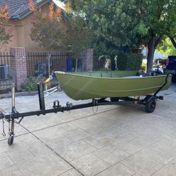 12 ft Aluminum Fishing/Duck Boat with motor and trailer 