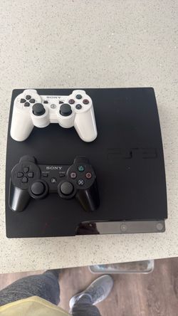 Sony PlayStation 3 Slim with Two Controllers