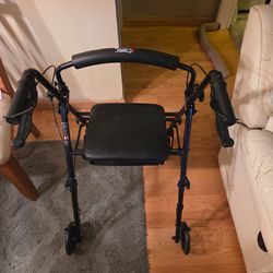 Walker/ with storage and a sit