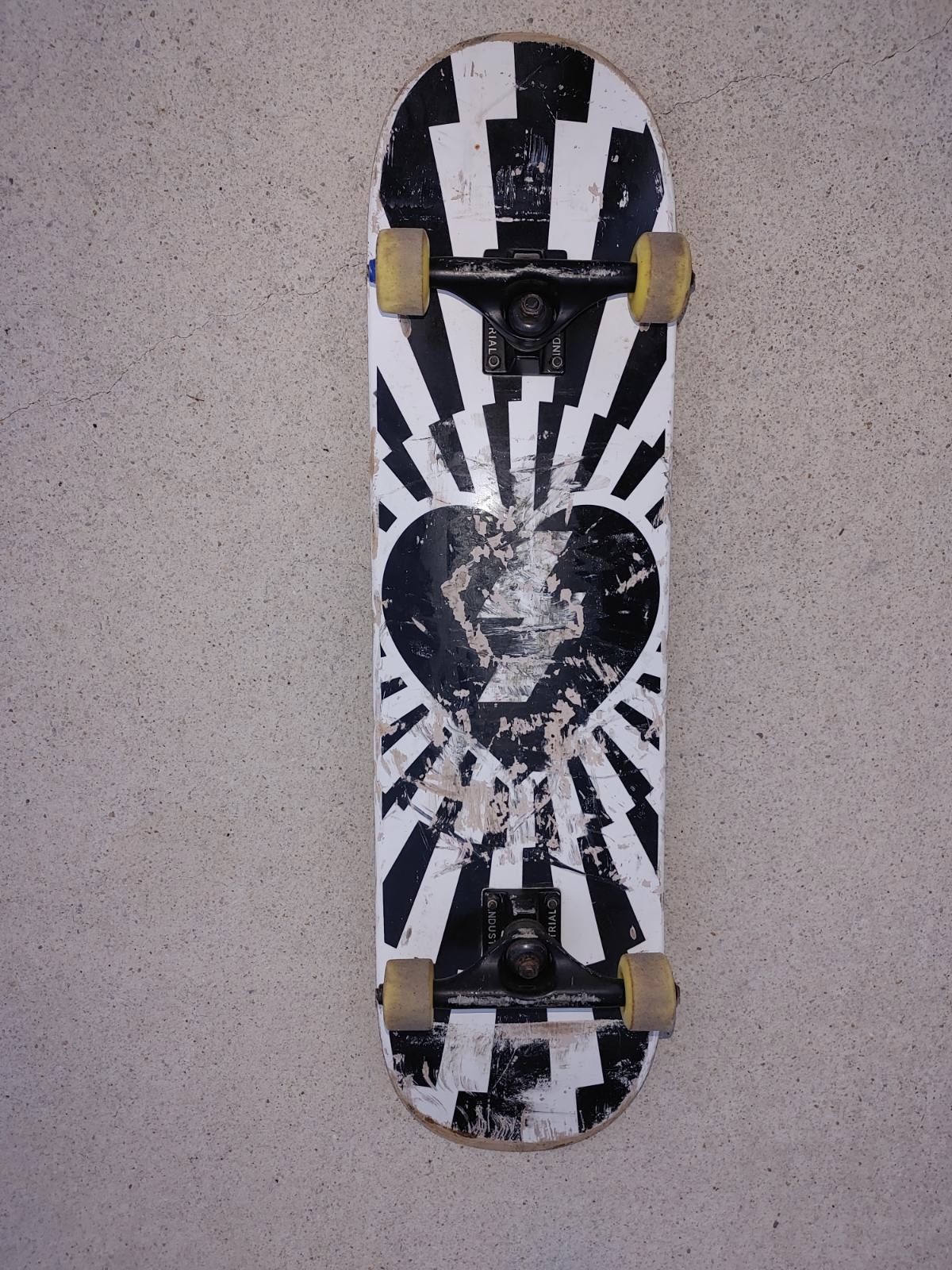 Preowned skate board with industrial trucks
