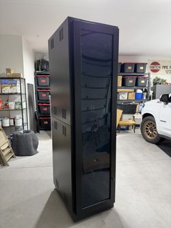 Winsted 46U enclosed rack server / data cabinet or rach on casters.