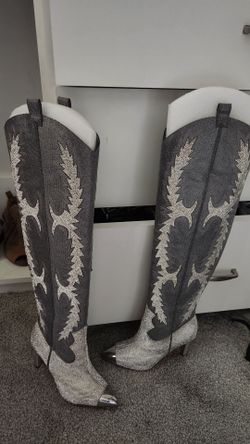 Over the knee silver boots