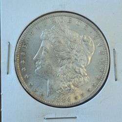 Silver Antique Collectible Morgan dollar dated 1884. MS+ BU Brilliant Uncirculated gorgeous condition. Purchased from Northern Nevada Coin Shop 