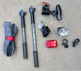 Bicycle parts. Tube air pumps, and lights.