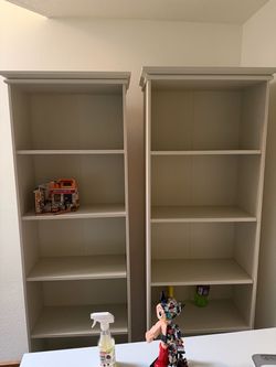 Two white bookshelves from ikea