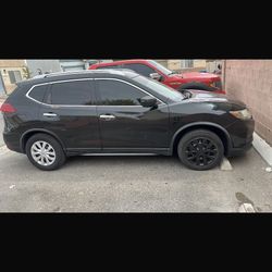 Black Nissan Rogue 