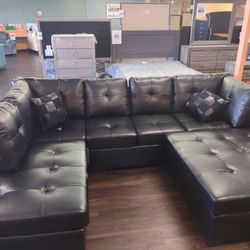 GENUINE LEATHER SECTIONAL SOFA WITH OTTOMAN