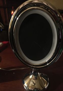 Sharper image make up mirror with 10x magnifying