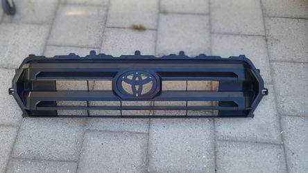 2024 - 2026 TOYOTA TACOMA SR SR5 CENTER MESH GRILLE GRILL GENUINE USED OEM.  XXX4