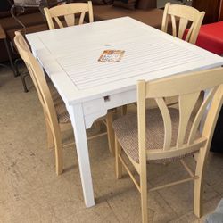 Brand new dinette and four chairs
