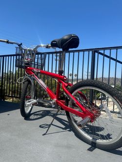 Mongoose BMX bike (basket and pegs included)