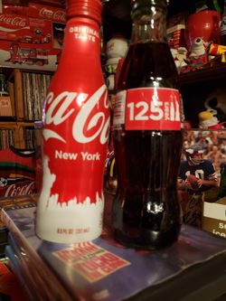2 Coca-Cola statue of liberty bottles