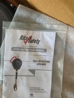 Self retracting lifeline