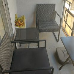 Terrace chairs, table and sun umbrella