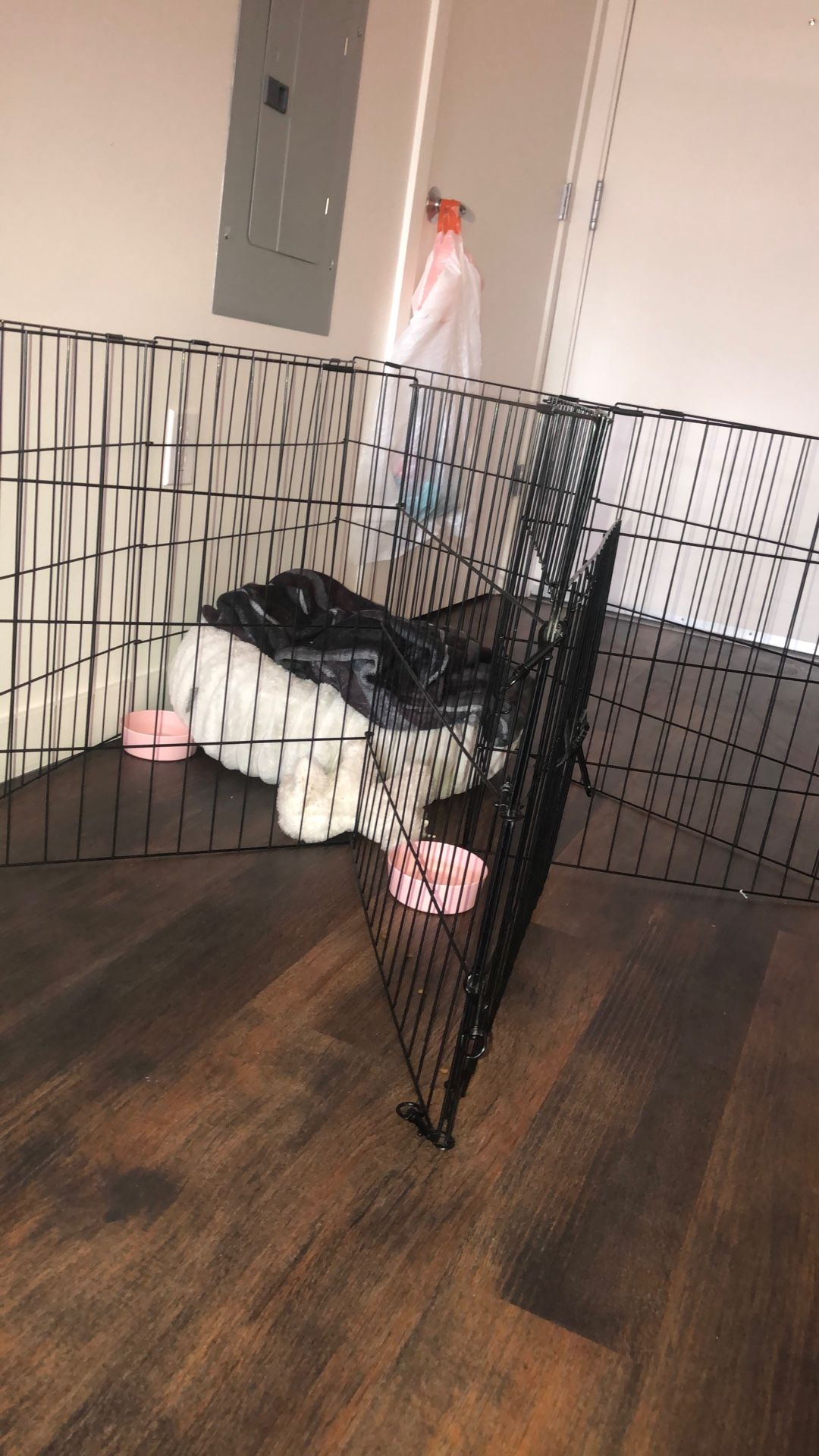 Large Dog Gate Doggy Bed And Two Pink Bowls
