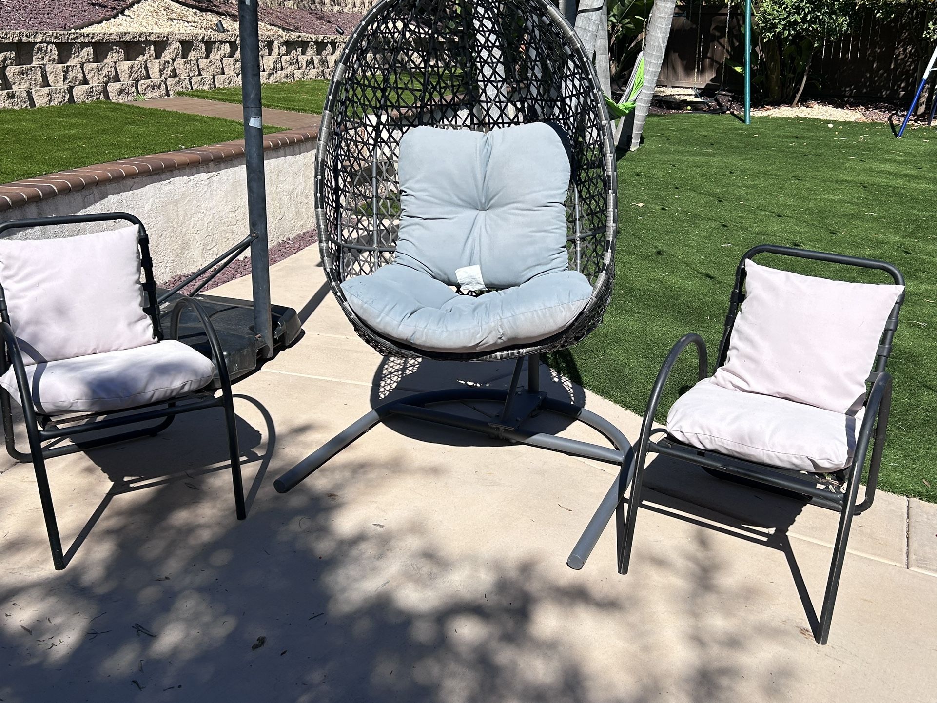 One big egg Chair And 2 Small Chairs