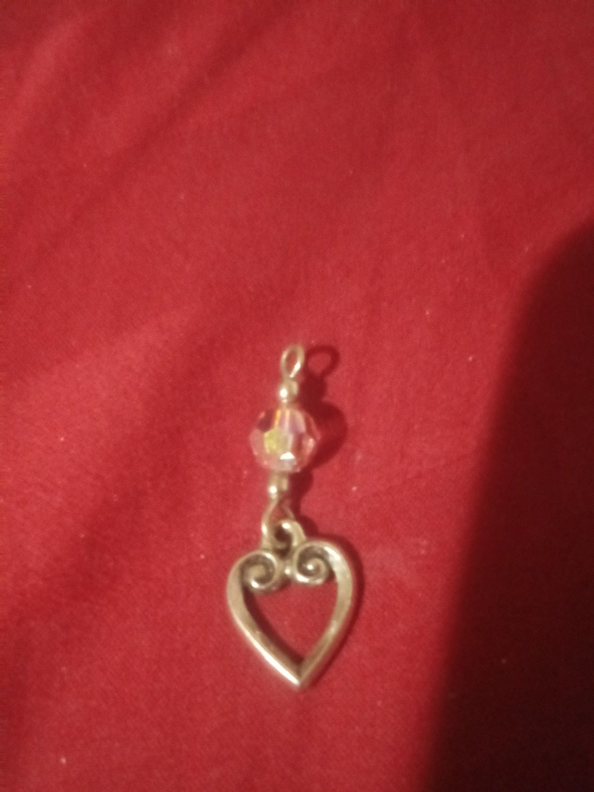 Elegant heart charm for a necklace