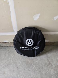 Modern Spare Tesla Tire And Accessory Kit