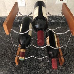 The sharper image 9-bottle wine rack.