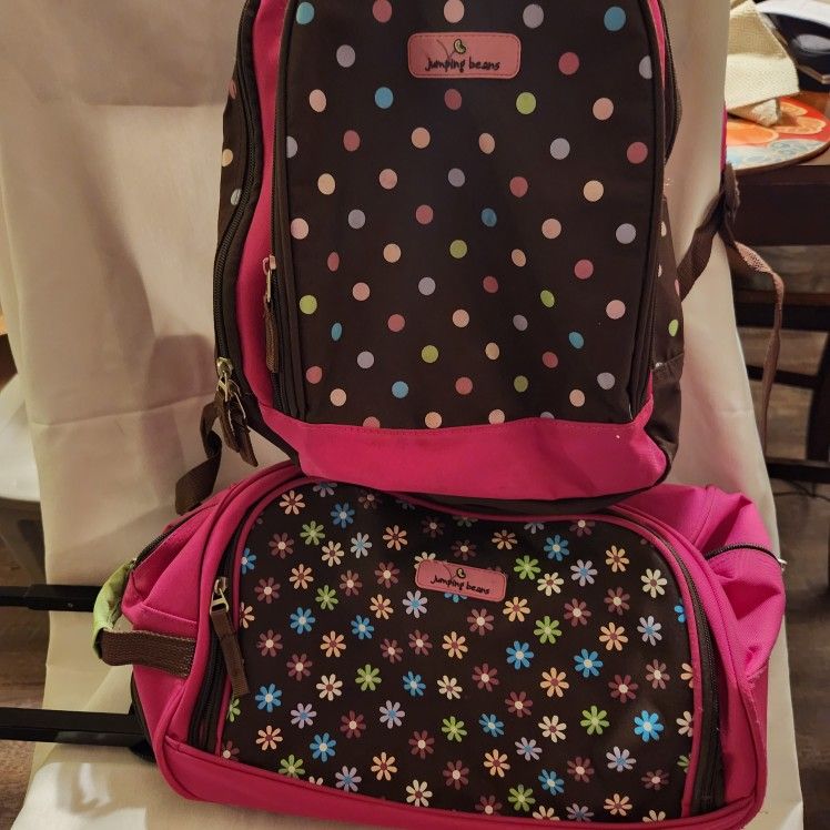 Little girls very nice bags Jumping Beans.
backpack/ roling bag. Very cute
design and all the high quality Jumping Beans has to offer. Great conditio