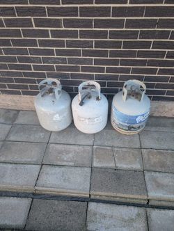 Propane Tanks The Rhino One Has Some Fuel Still In It. For BBQ Grills Etc Price Is For Each