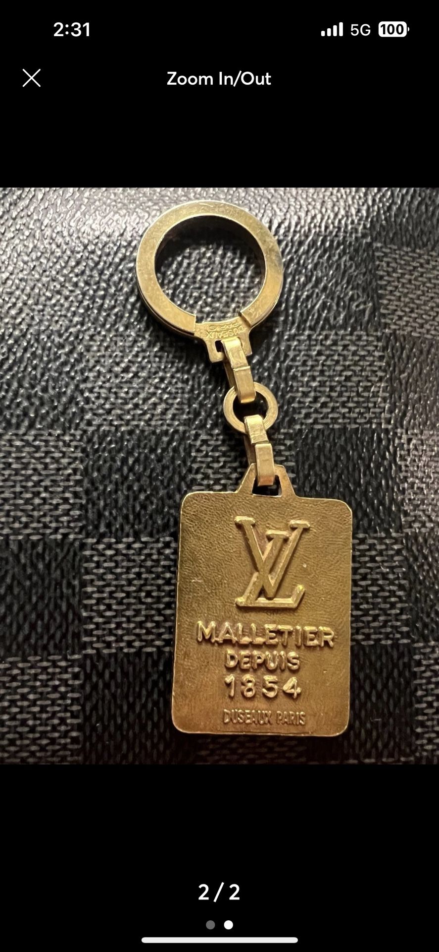 Louis Vuitton Malletier Depuis 1854 key ring
