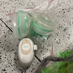 Breast Pump ( Free)