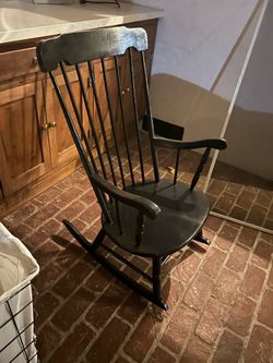 Black wooden rocking chair