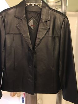 Ladies.   Leather jacket black 3 button. So soft!! Great condition